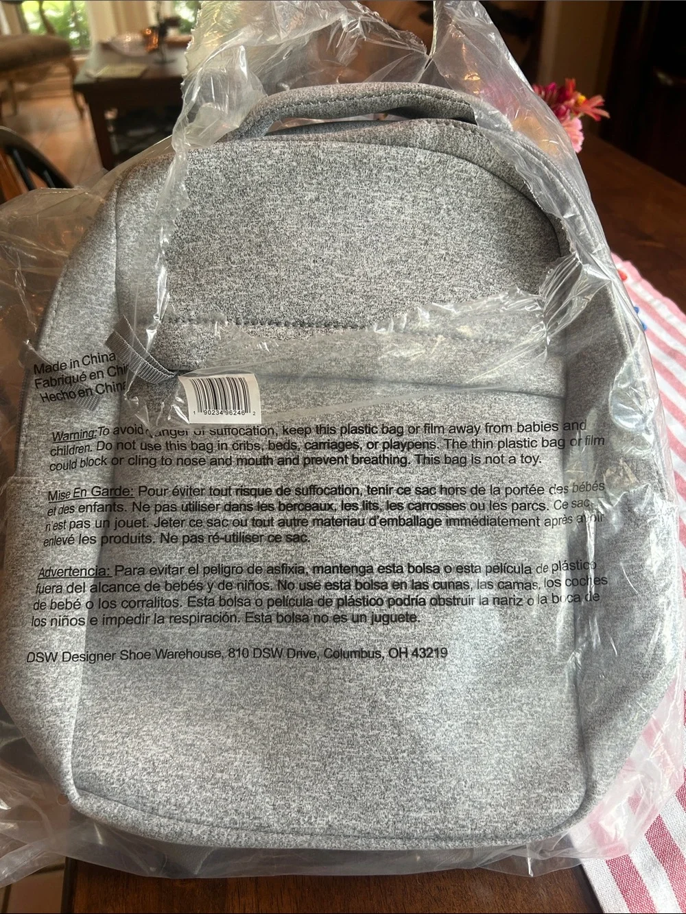 DSW never used, still in bag. Light Gray Heather fabric Backpack